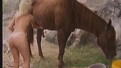 Blonde Girl Enjoys Wild Ride with Horse Porn