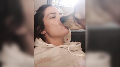 boss and mabel kiss dog
