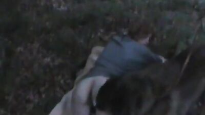 Woman sticks ass out for dog to fuck outdoors