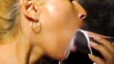 pretty blonde moans loudly as she sucks a big horse cock