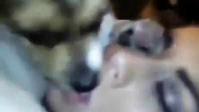 Beautiful girl french kiss with dog