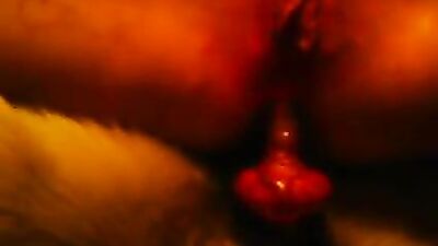 Busty Brazilian Babe Gags on Massive Canine Cock