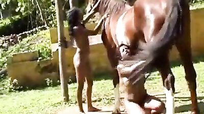 Womans enjoying horse cock