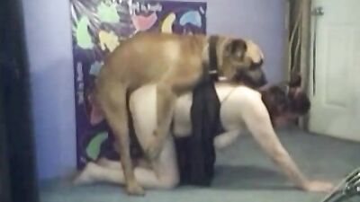 Chubby mom plays with dog