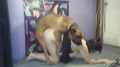 Chubby mom plays with dog