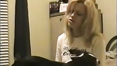 Blonde kissing dog