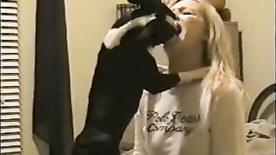 Blonde kissing dog
