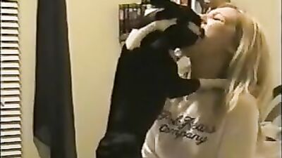 Blonde kissing dog