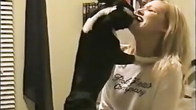 Blonde kissing dog