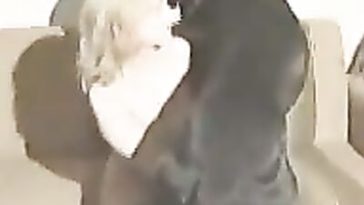 Big Black Dog And Blonde Woman