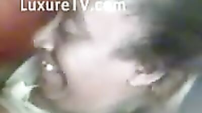 Woman gives puppy to suck 2