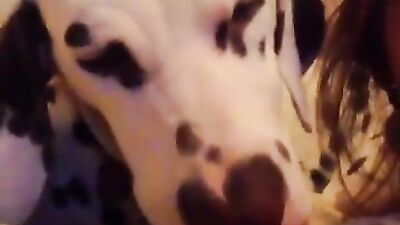 woman warms up with her dog