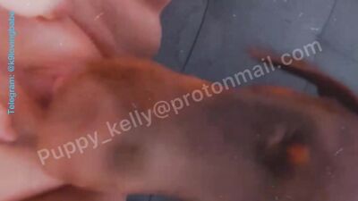 Teen gets licked by two dogs