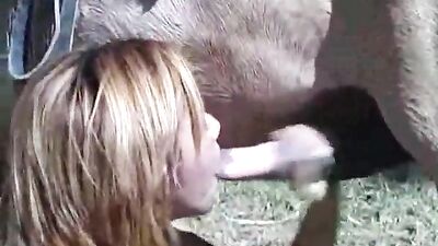 Blond vixen deep throats dogcock in wild zoo orgy