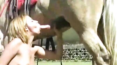 Blond vixen deep throats dogcock in wild zoo orgy