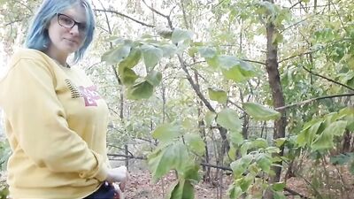 Caught masturbating in a wood with her big tits