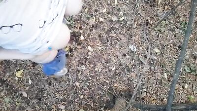 Caught masturbating in a wood with her big tits
