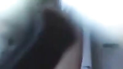 Hot brune girl in an edgy get-up fucks a dog