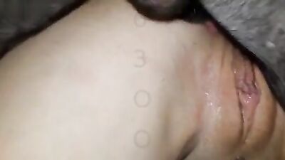 Horny lady with a trimmed snatch fucks a doggo