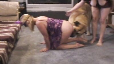 Captive Slut Serves Two Masters in Lewd Humiliation