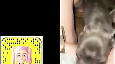 KBritty sneaks outside and has fun with her pup