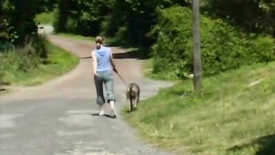 Nice girl takes her dog